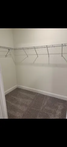 a view of small space with racks on the wall