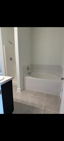 a view of a bathtub in a bathroom