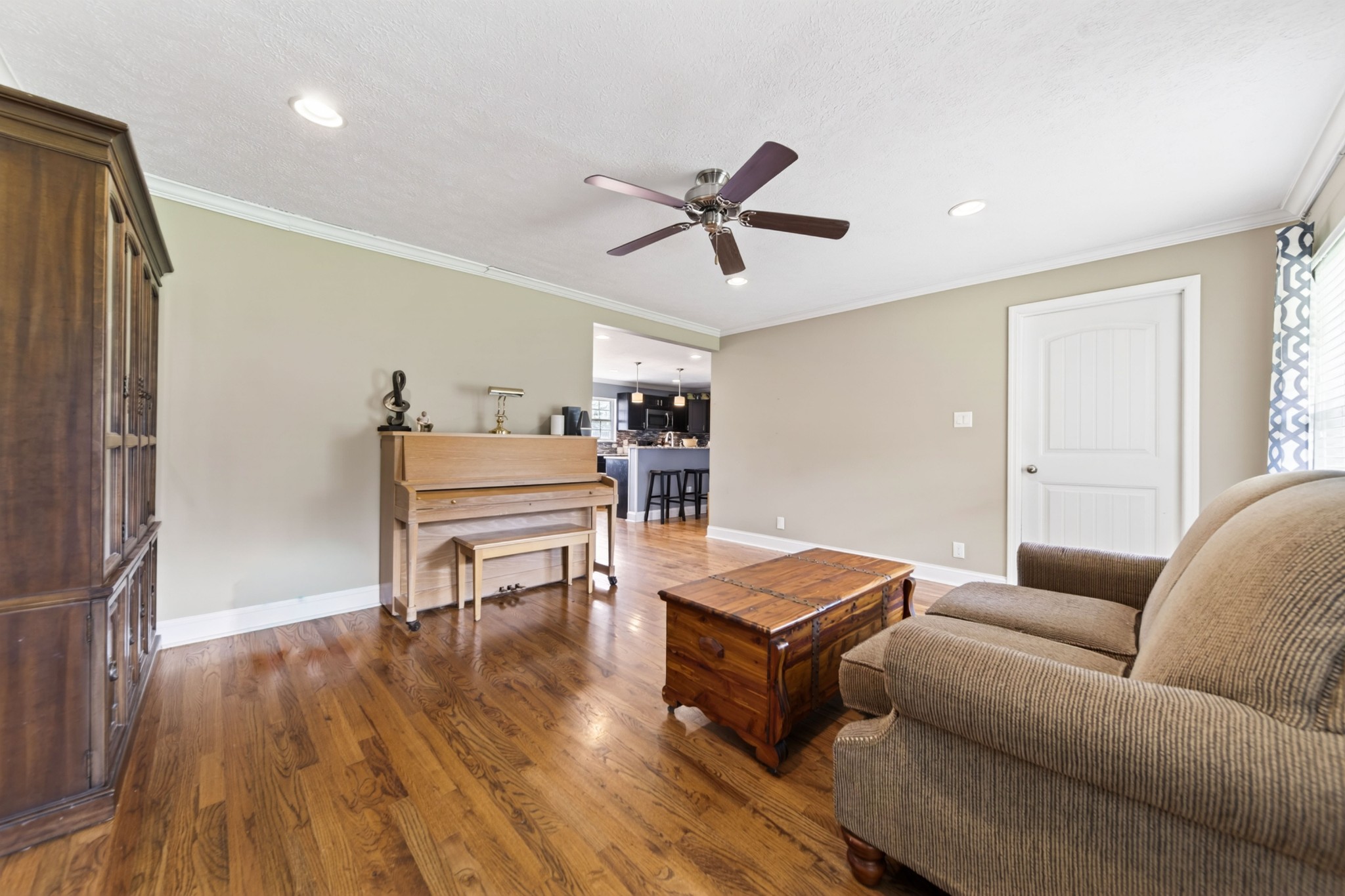 8023 Bethlehem Road Springfield, TN 37172 - Photo 26 of 55 a living room with furniture and a wooden floor