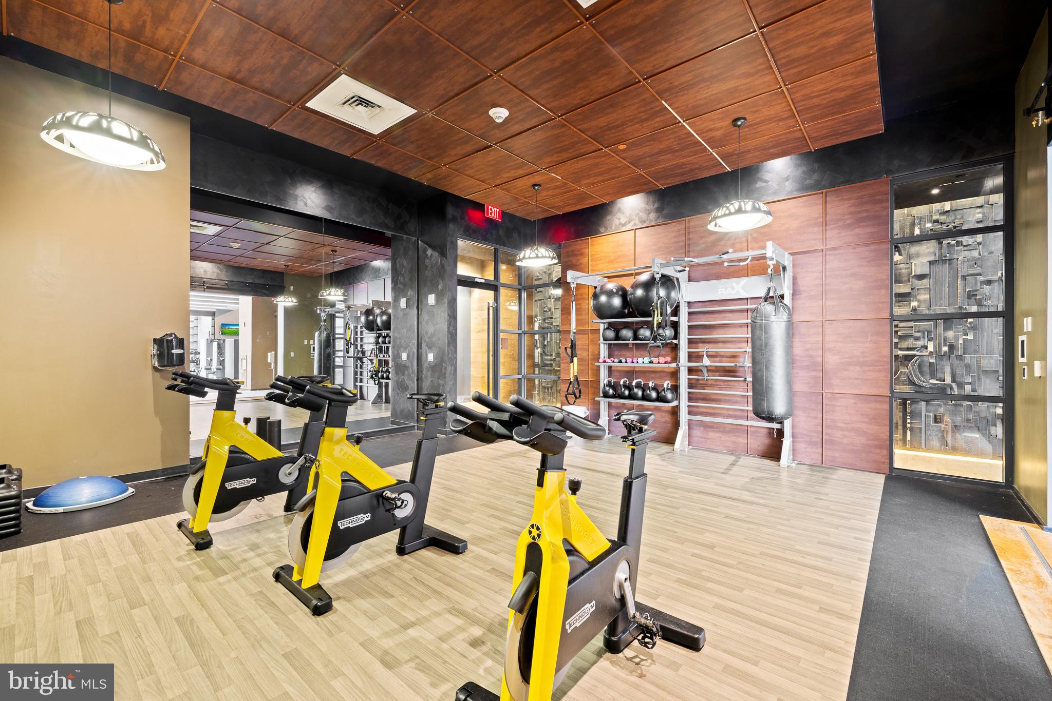 1213 Walnut Street, Unit 1909 Philadelphia, PA 19107 - Photo 18 of 36 a view of a room with gym equipment