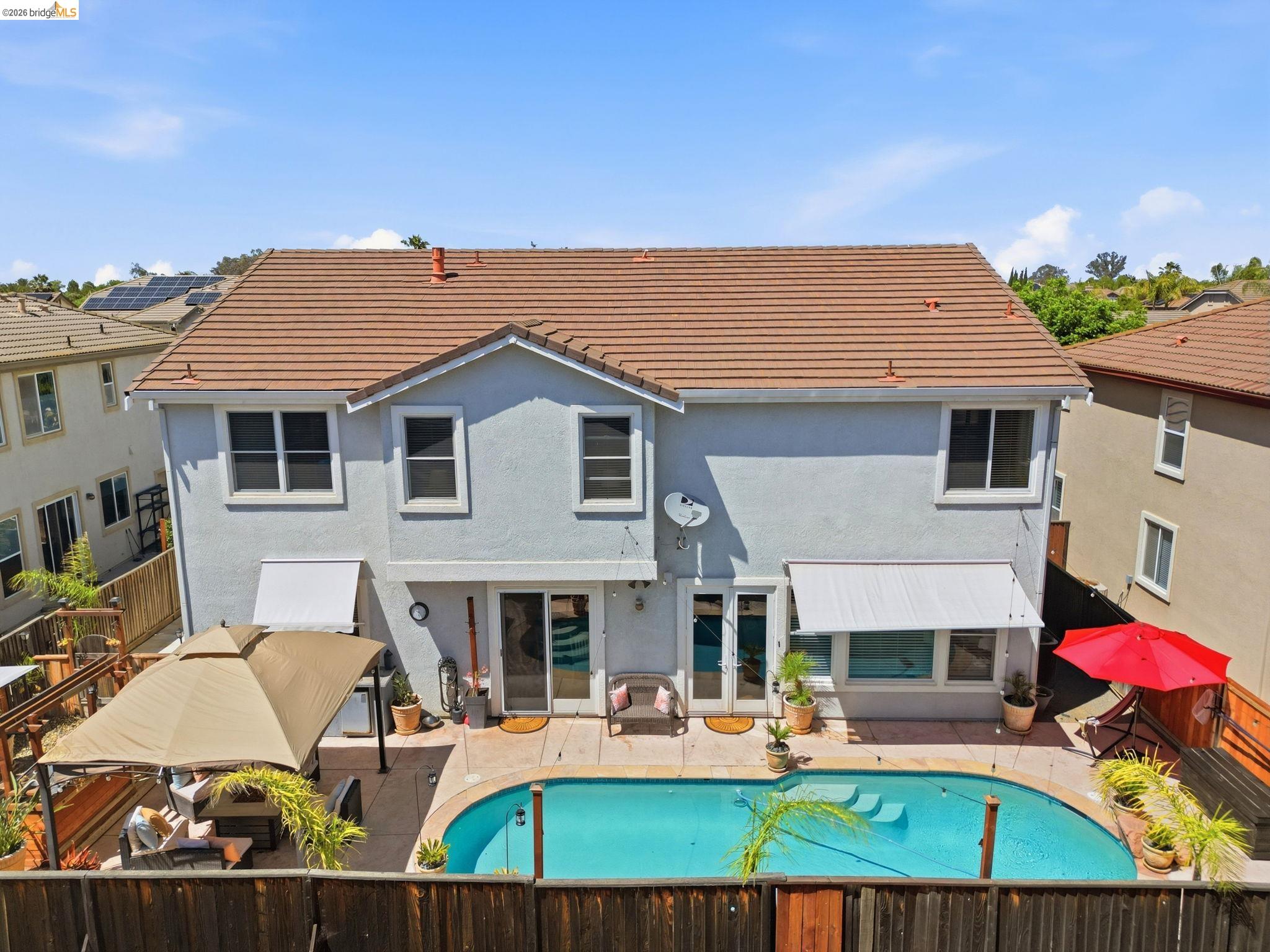 3438 Keystone Loop Discovery Bay, CA 94505 - Photo 53 of 57 a view of a house with outdoor seating space