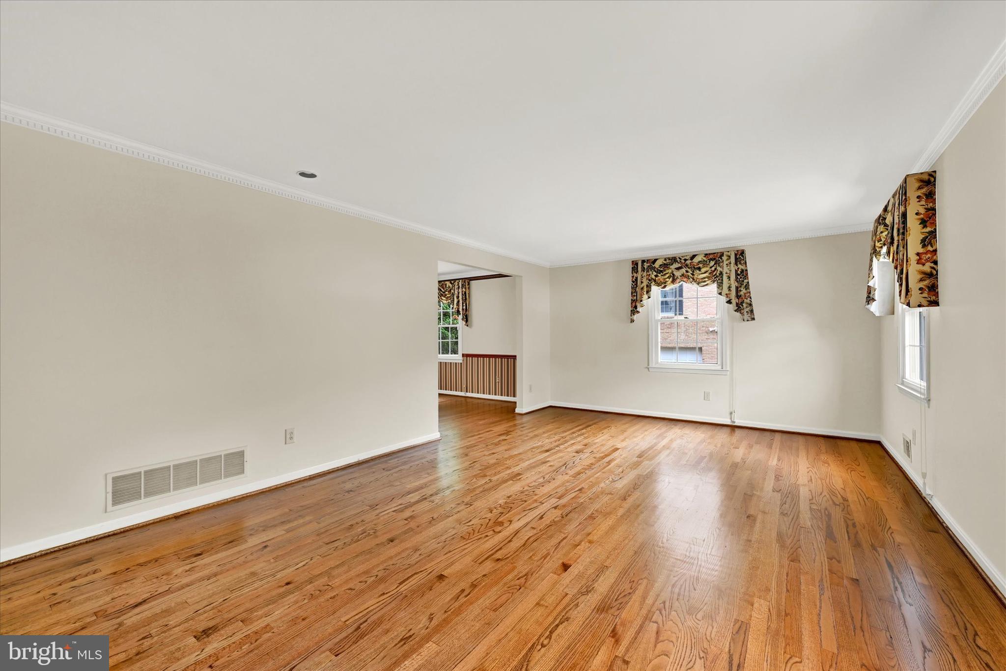 1115 Valewood Road Towson, MD 21286 - Photo 4 of 40 Living Room to Dining Room with Crown Molding