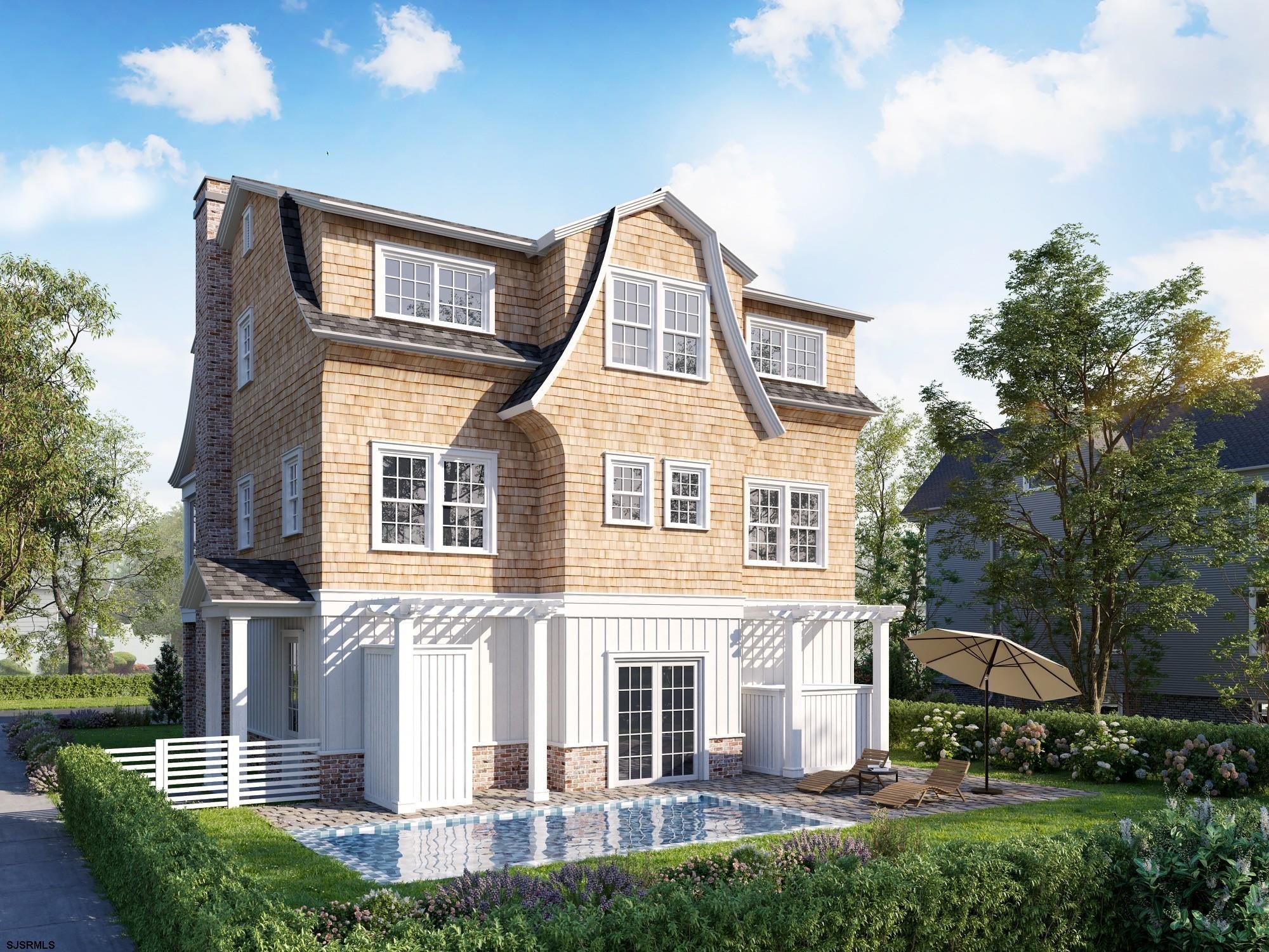 19 East Dundee Road Ocean City, NJ 08226 - Photo 2 of 6 a front view of a house with a yard