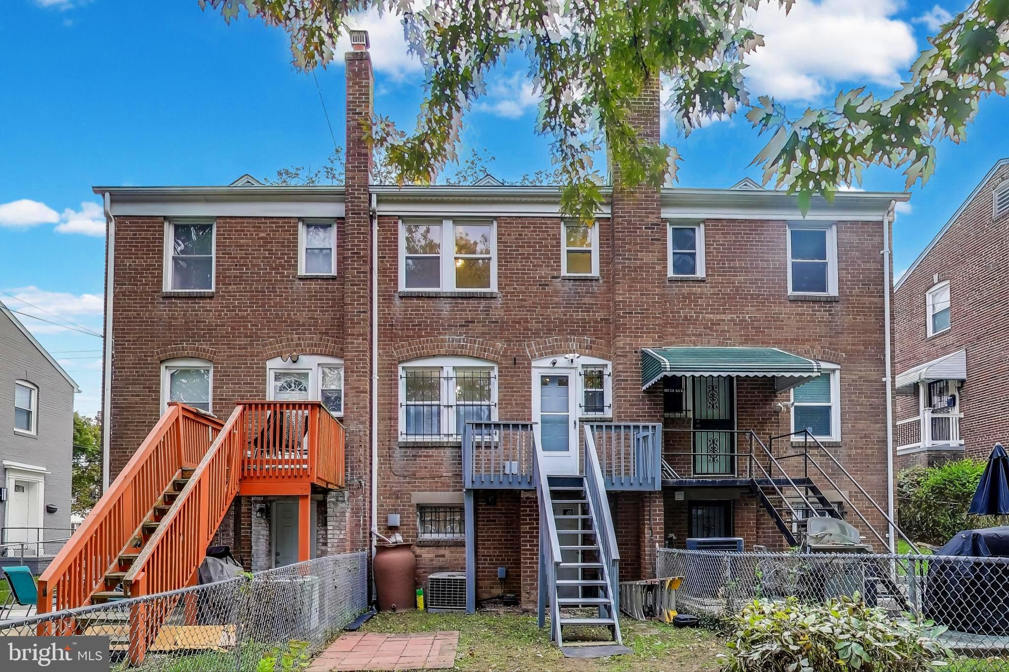 418 Peabody Street Northeast Washington, DC 20011 - Photo 15 of 20 a front view of a house with balcony