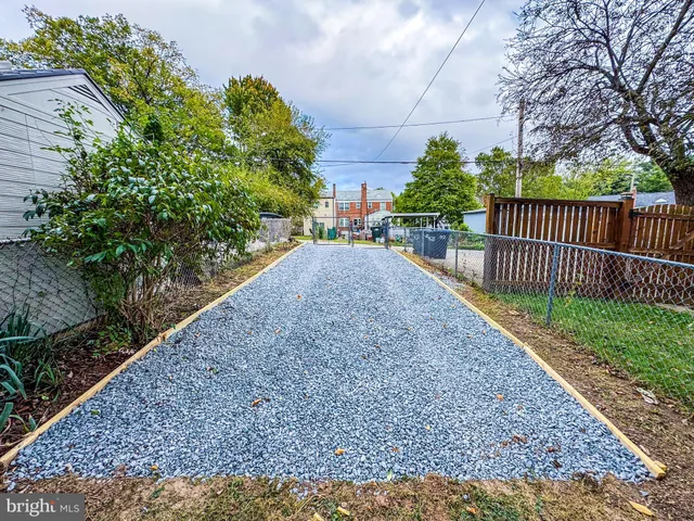 a view of a yard and front view of a house