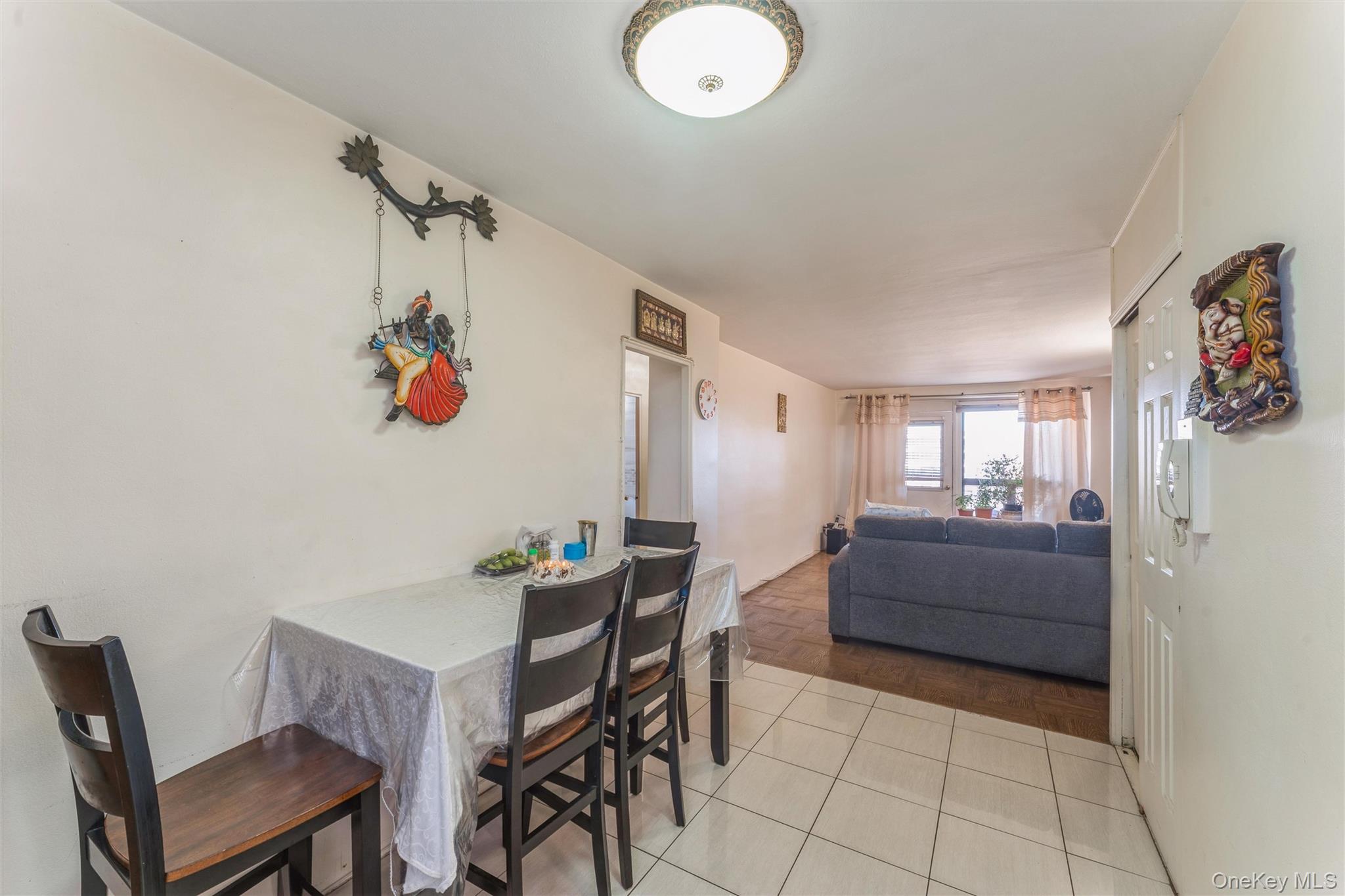 61-15 98th Street, Unit I6 H Queens, NY 11374 - Photo 11 of 25 a view of a dining room with furniture