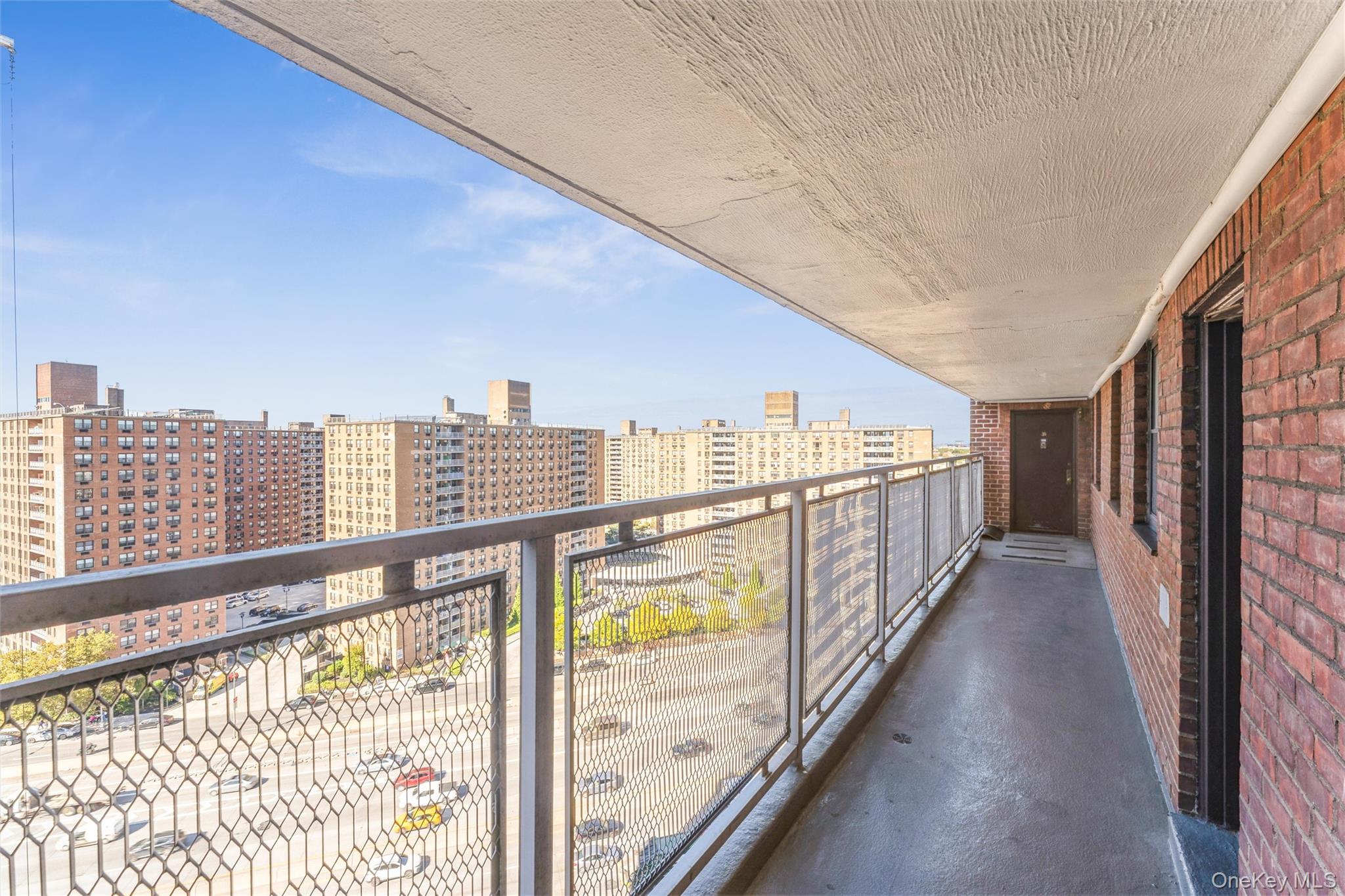 61-15 98th Street, Unit I6 H Queens, NY 11374 - Photo 14 of 25 a view of a balcony with city view