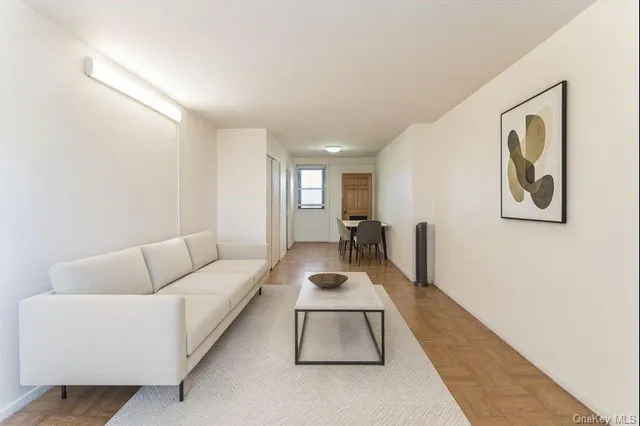 a living room with furniture and a table