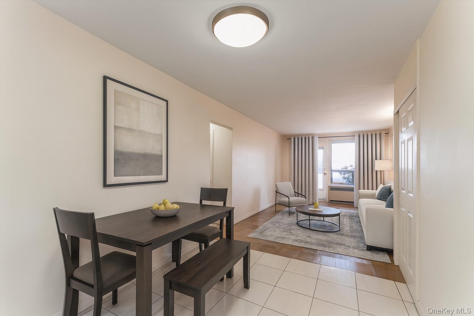 61-15 98th Street, Unit I6 H Queens, NY 11374 - Photo 10 of 25 a view of a dining room with furniture