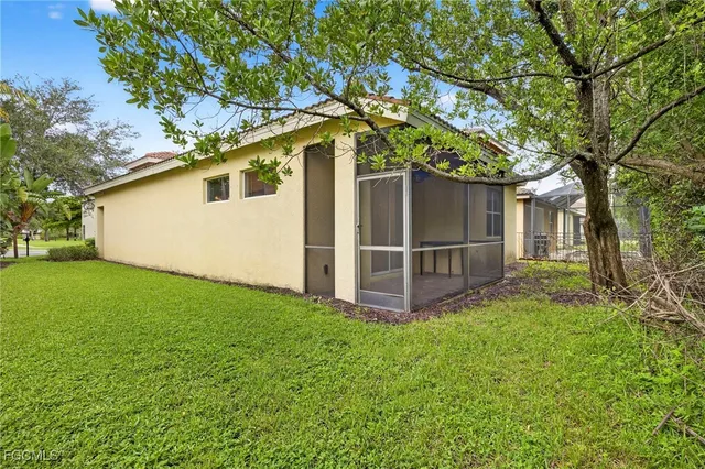 a house with a tree in front of it
