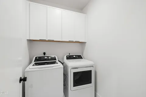 an empty room with wooden floor