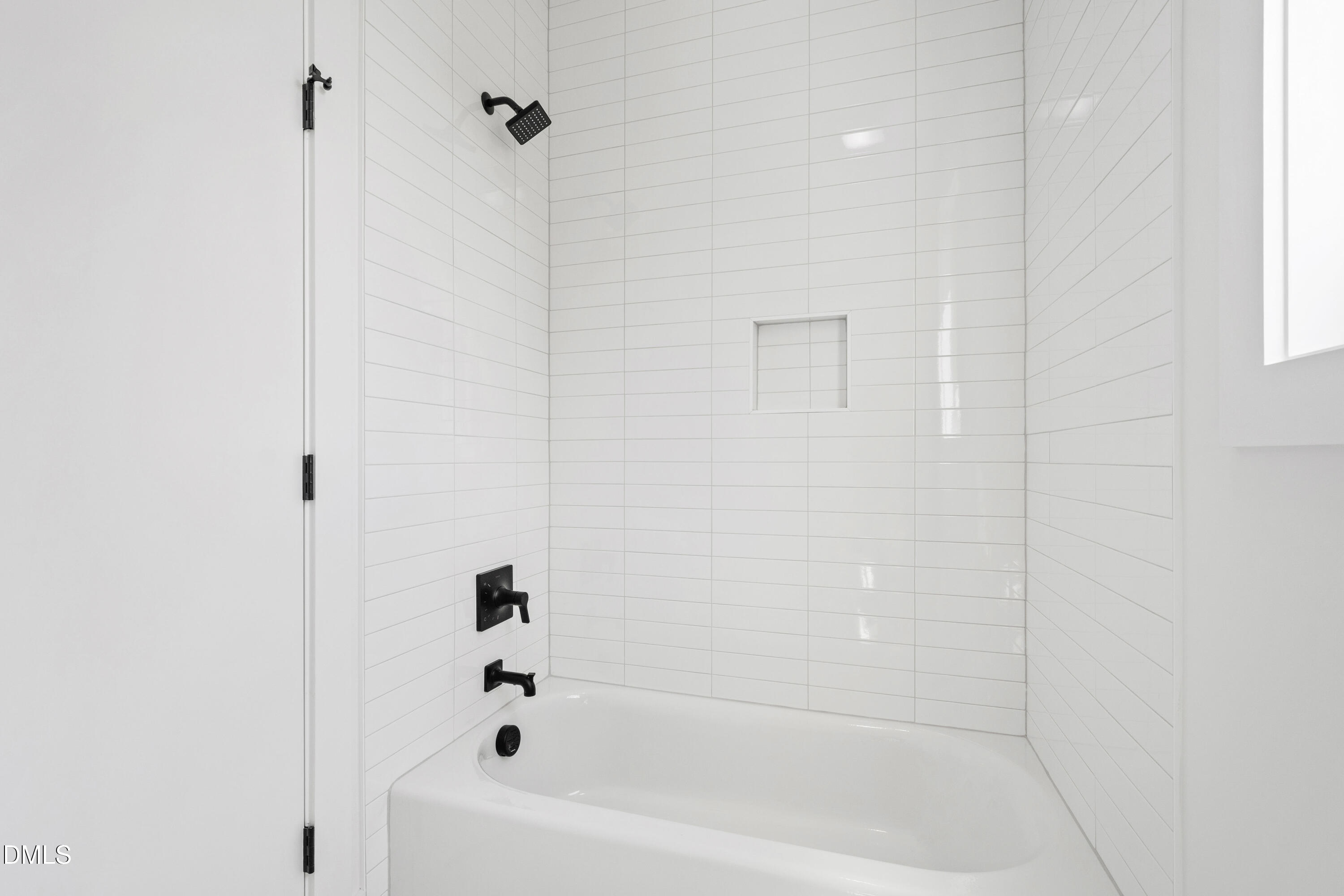 1510 Boyer Street Raleigh, NC 27610 - Photo 30 of 52 a bathroom with a bathtub
