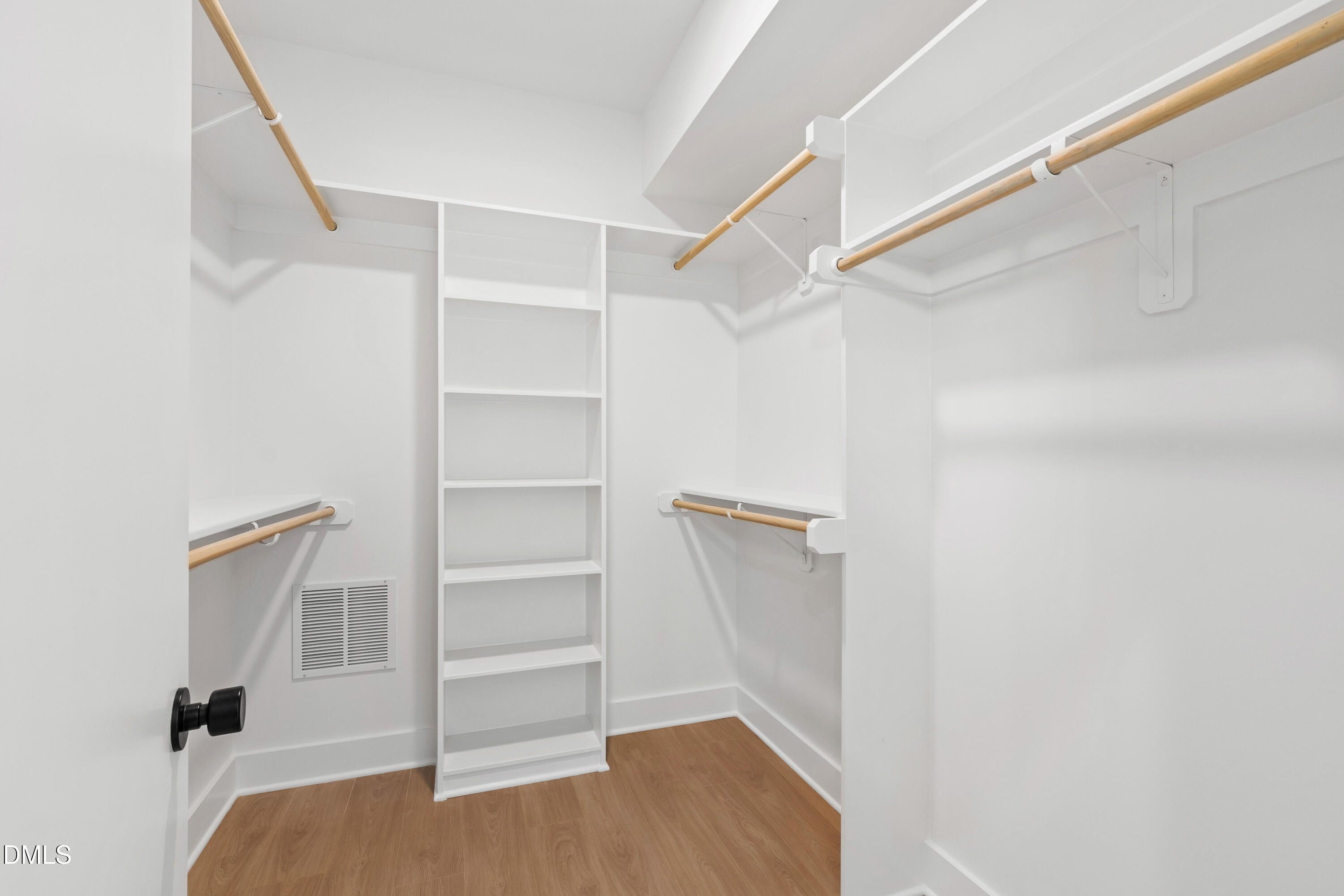 1510 Boyer Street Raleigh, NC 27610 - Photo 40 of 52 a view of walk in closet with empty racks