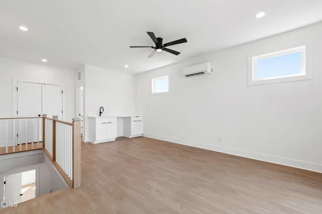 a utility room with sink dryer and washer
