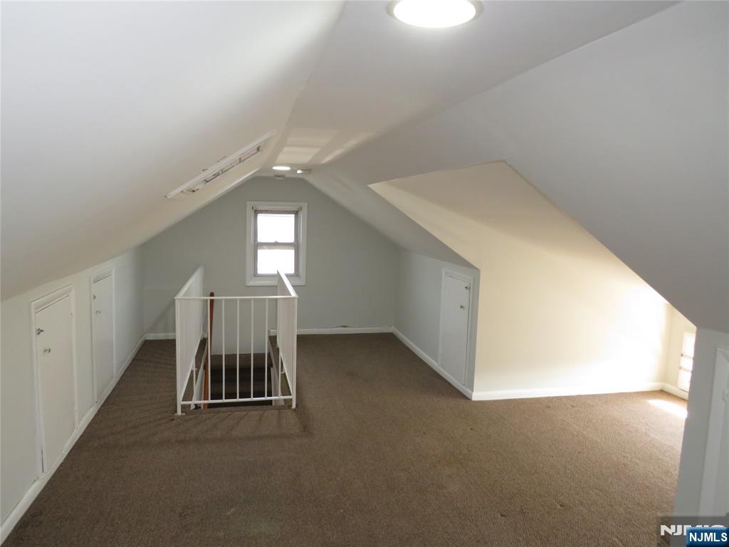 11 Louis Street, Unit 2 Lodi, NJ 07644 - Photo 17 of 19 a view of livingroom and window