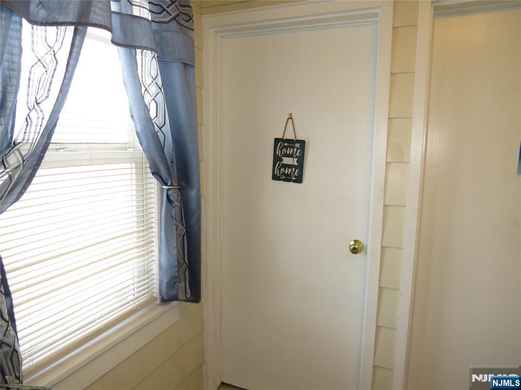 11 Louis Street, Unit 2 Lodi, NJ 07644 - Photo 2 of 19 a view of a door and a window