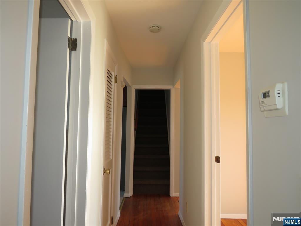 11 Louis Street, Unit 2 Lodi, NJ 07644 - Photo 4 of 19 a view of a hallway with a closet