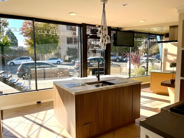 a kitchen with a sink and a large window