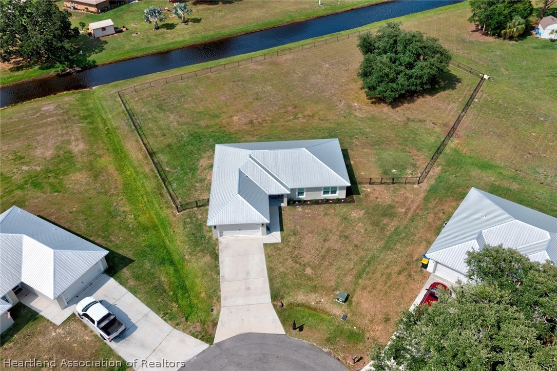 111 Vale Court Sebring, FL 33876 - Photo 34 of 40 an aerial view of a house with a yard