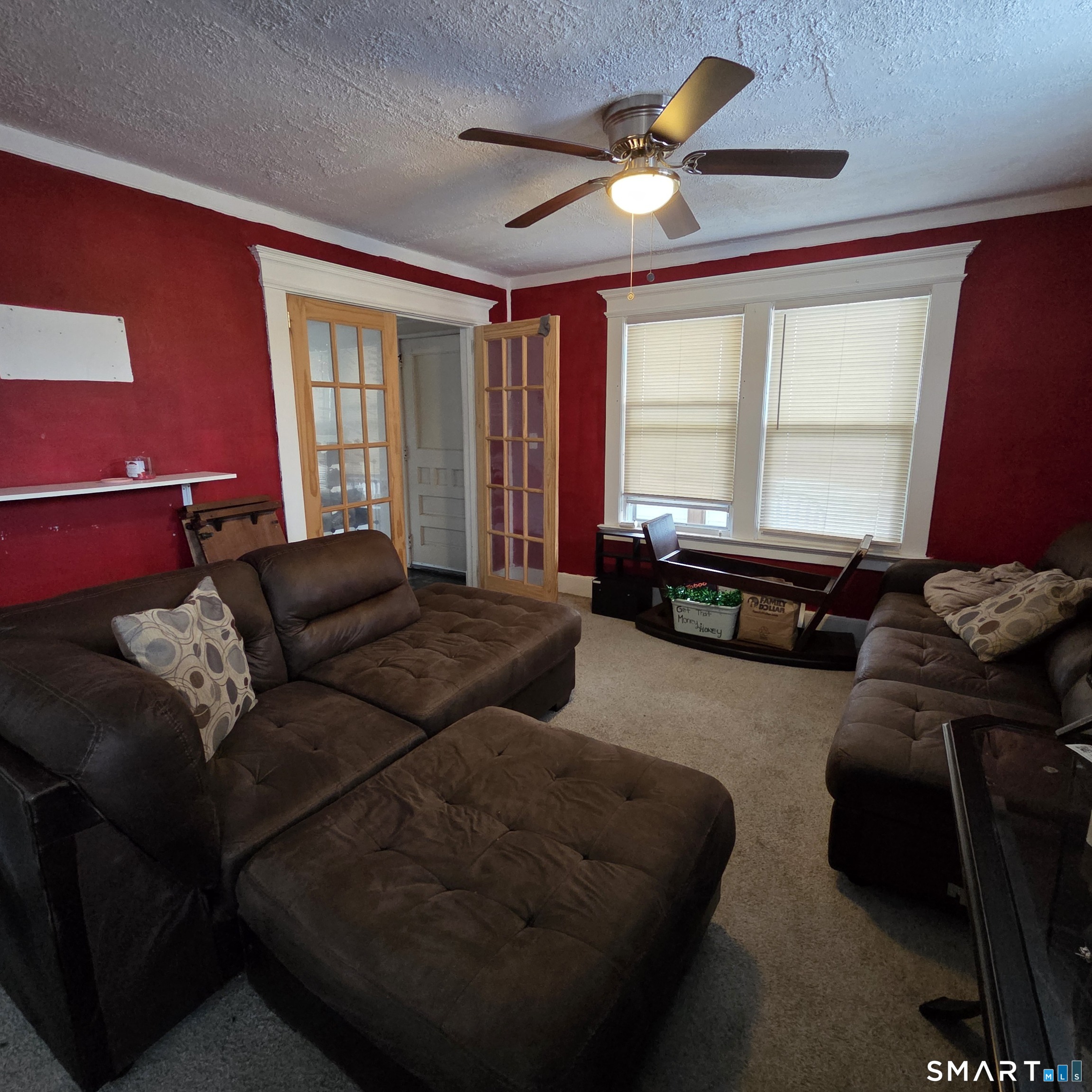 18 Darby Street Bloomfield, CT 06002 - Photo 7 of 33 a living room with furniture and a large window