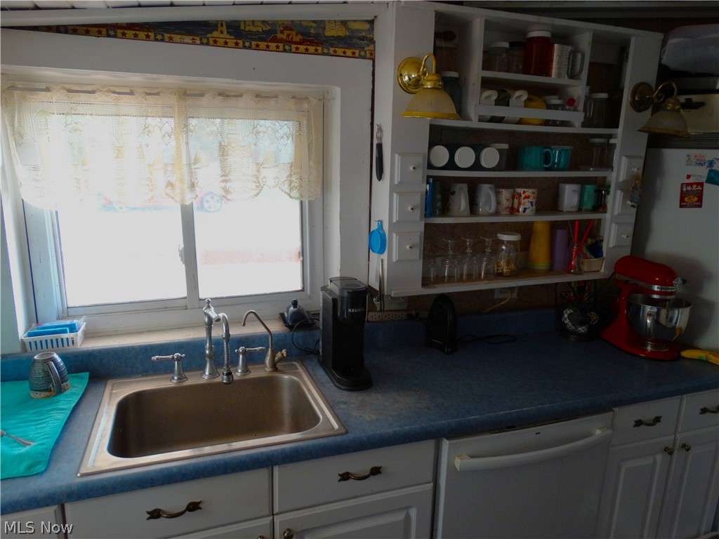 7759 North Ridge Road Madison, OH 44057 - Photo 5 of 14 Kitchen with sink and dishwasher