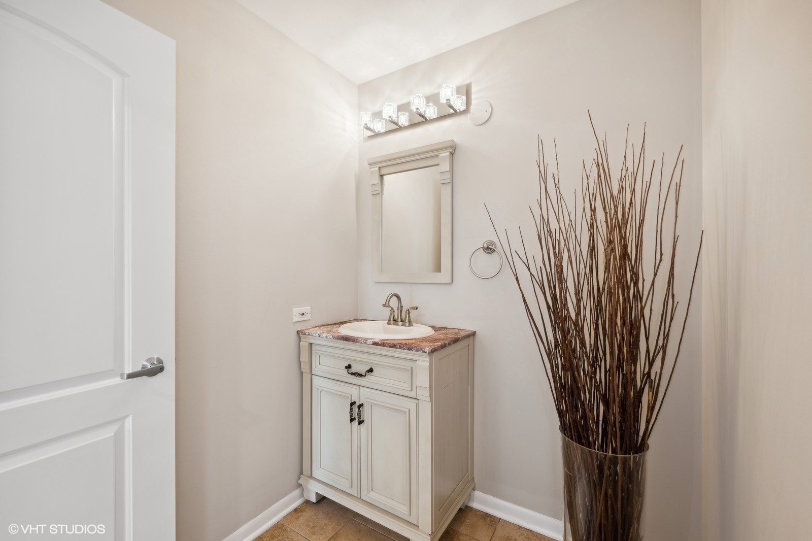 388 Milford Road Deerfield, IL 60015 - Photo 20 of 37 a view of a room with a sink and a mirror