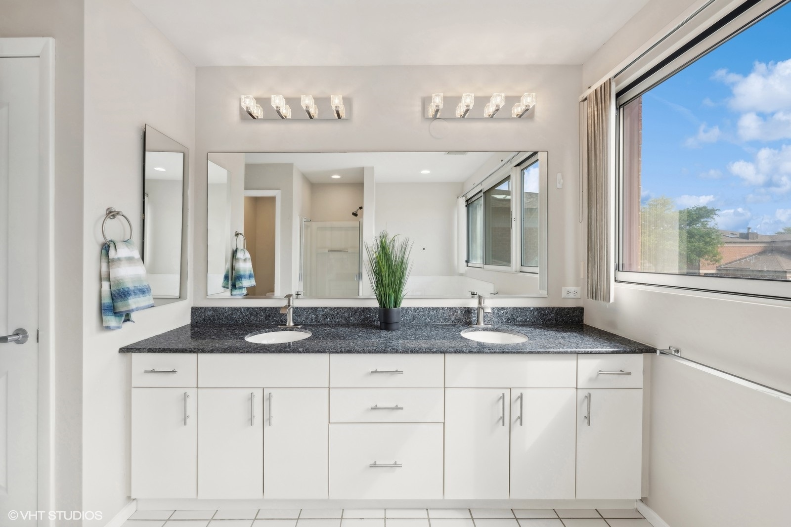 388 Milford Road Deerfield, IL 60015 - Photo 31 of 37 a bathroom with a granite countertop sink and a mirror