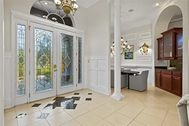 a view of a dining room with furniture and window