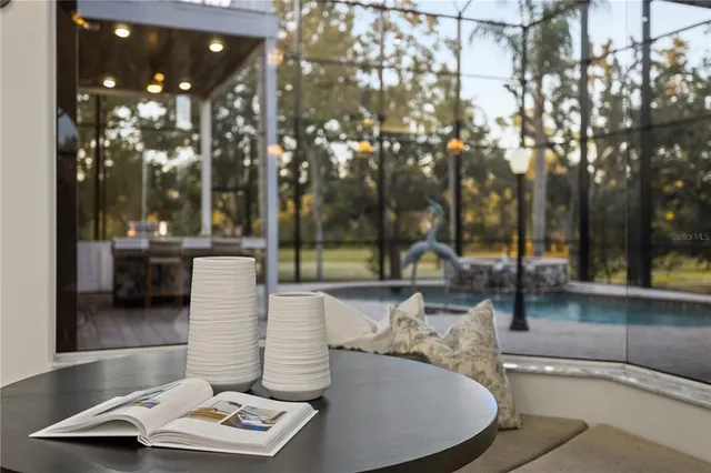 a view of staircase with railing and white walls
