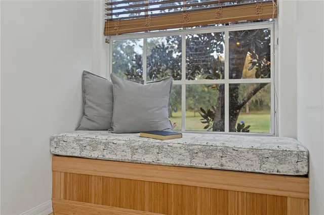 a kitchen with granite countertop a sink stainless steel appliances and cabinets