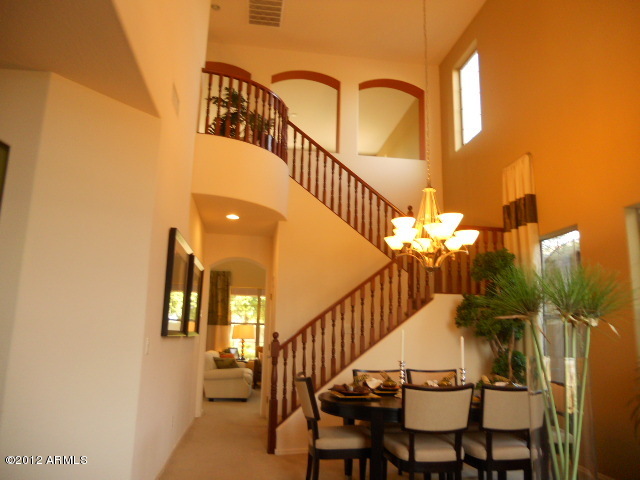 3092 East Ridgewood Lane Gilbert, AZ 85298 - Photo 3 of 5 Moonshadow dining and stair rail