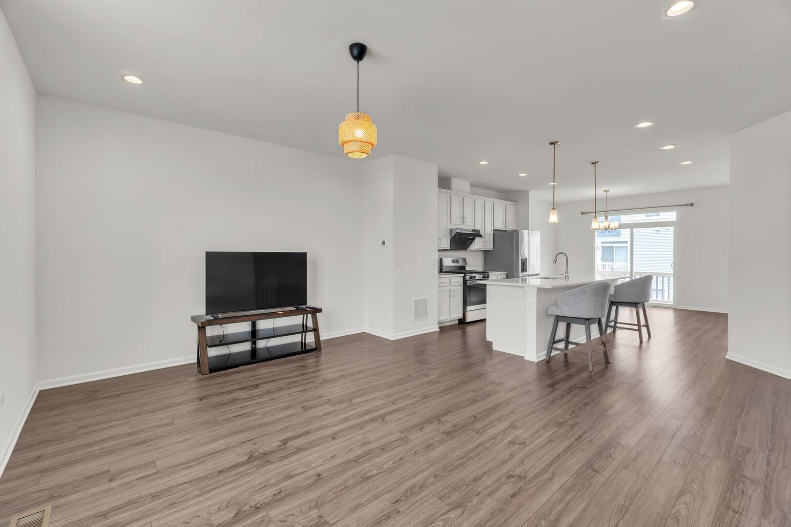 4138 Irving Road Aurora, IL 60504 - Photo 14 of 32 a view of kitchen with furniture and wooden floor