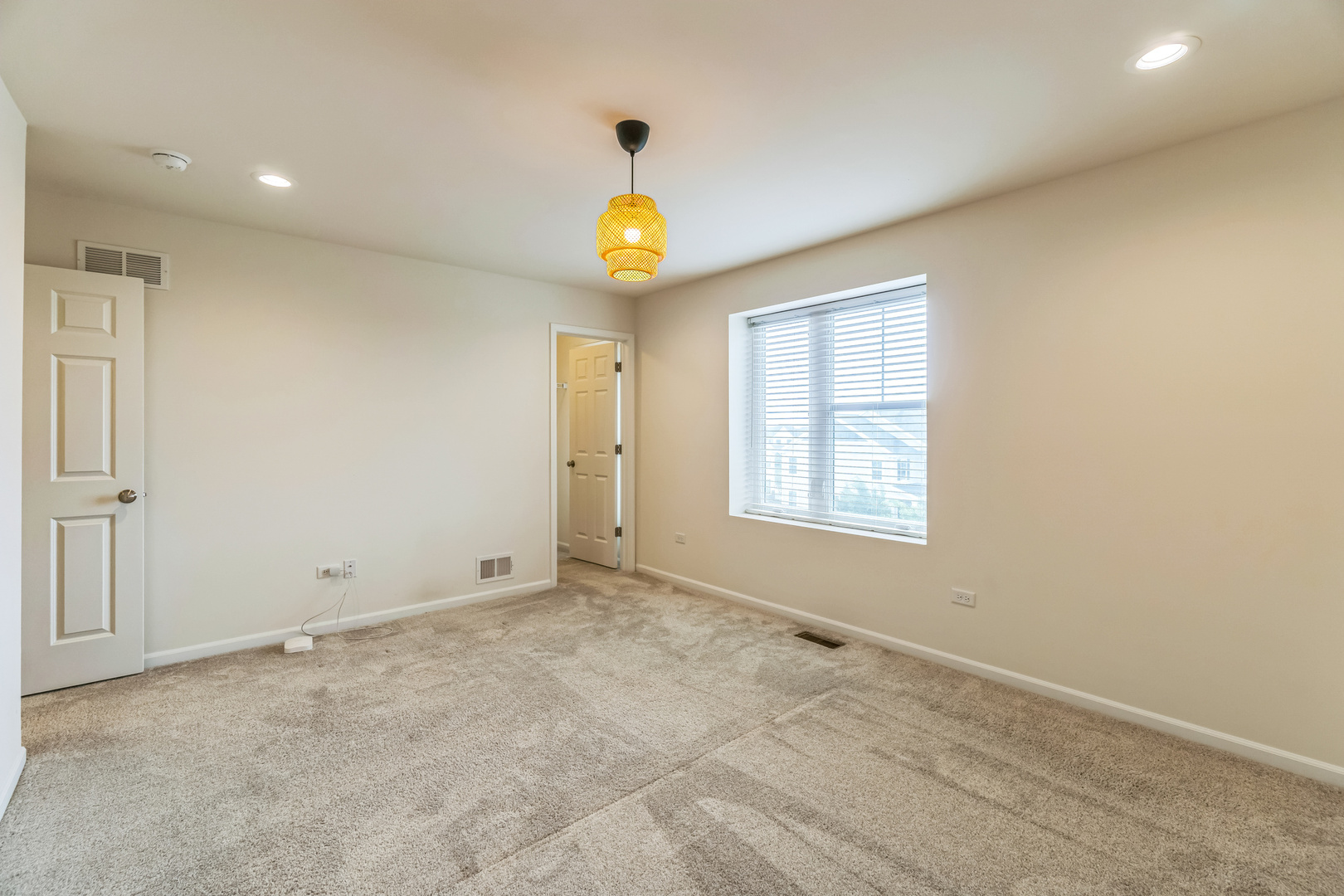 4138 Irving Road Aurora, IL 60504 - Photo 17 of 32 a view of an empty room with a window