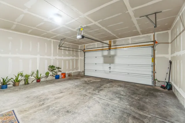 a view of a car park in front of house