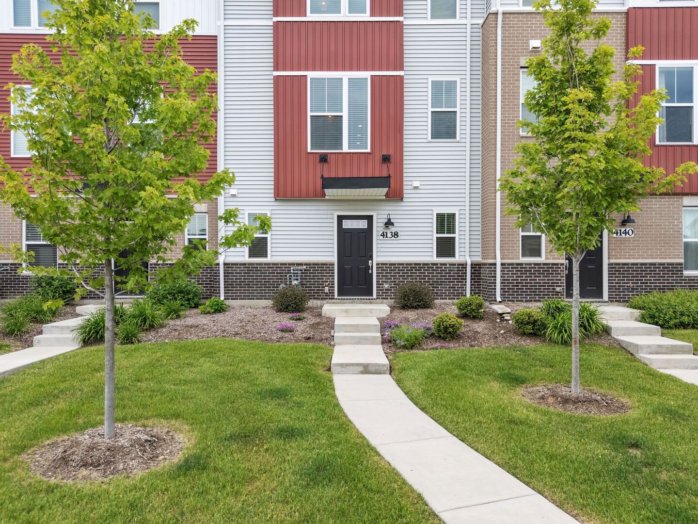 4138 Irving Road Aurora, IL 60504 - Photo 32 of 32 a front view of a house with a yard