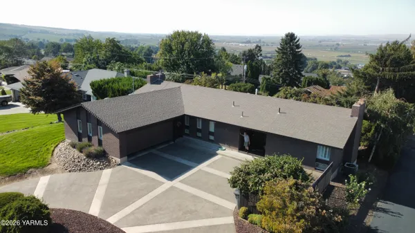 a house view with a garden space