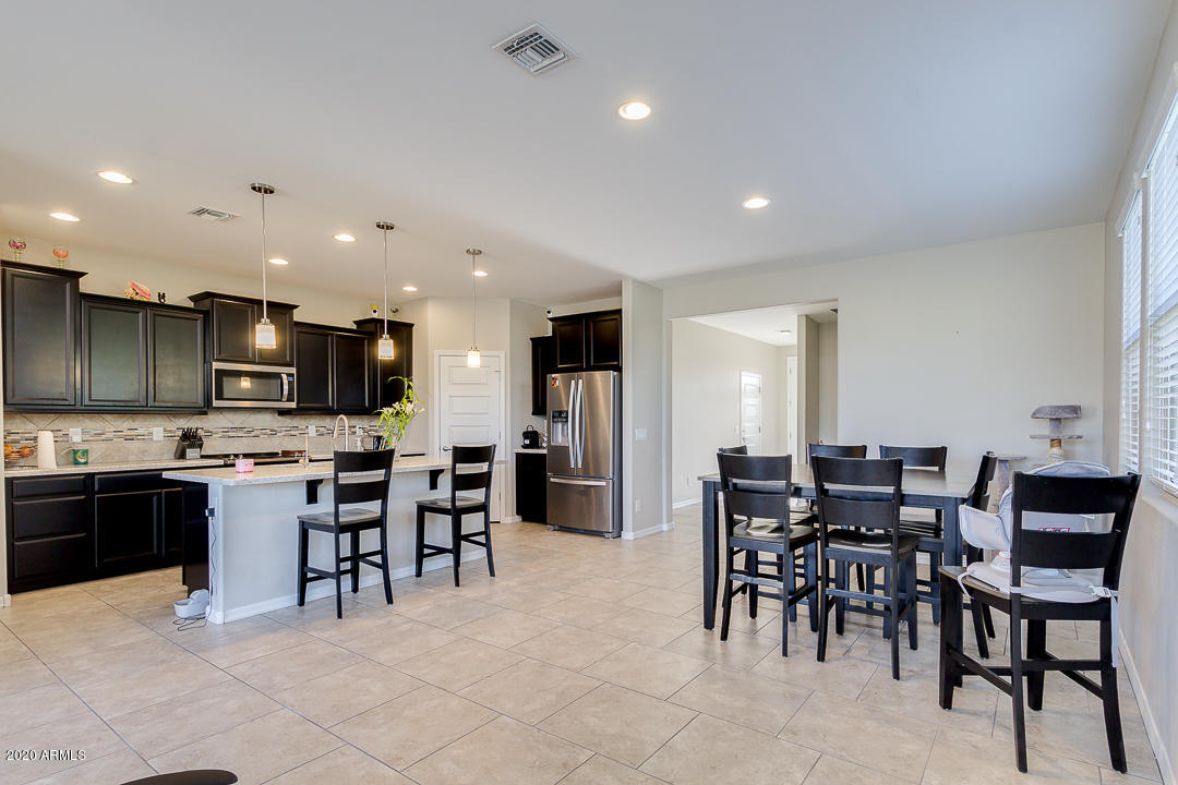 17736 West Sandy Road Goodyear, AZ 85338 - Photo 20 of 29 Kitchen/Family Room