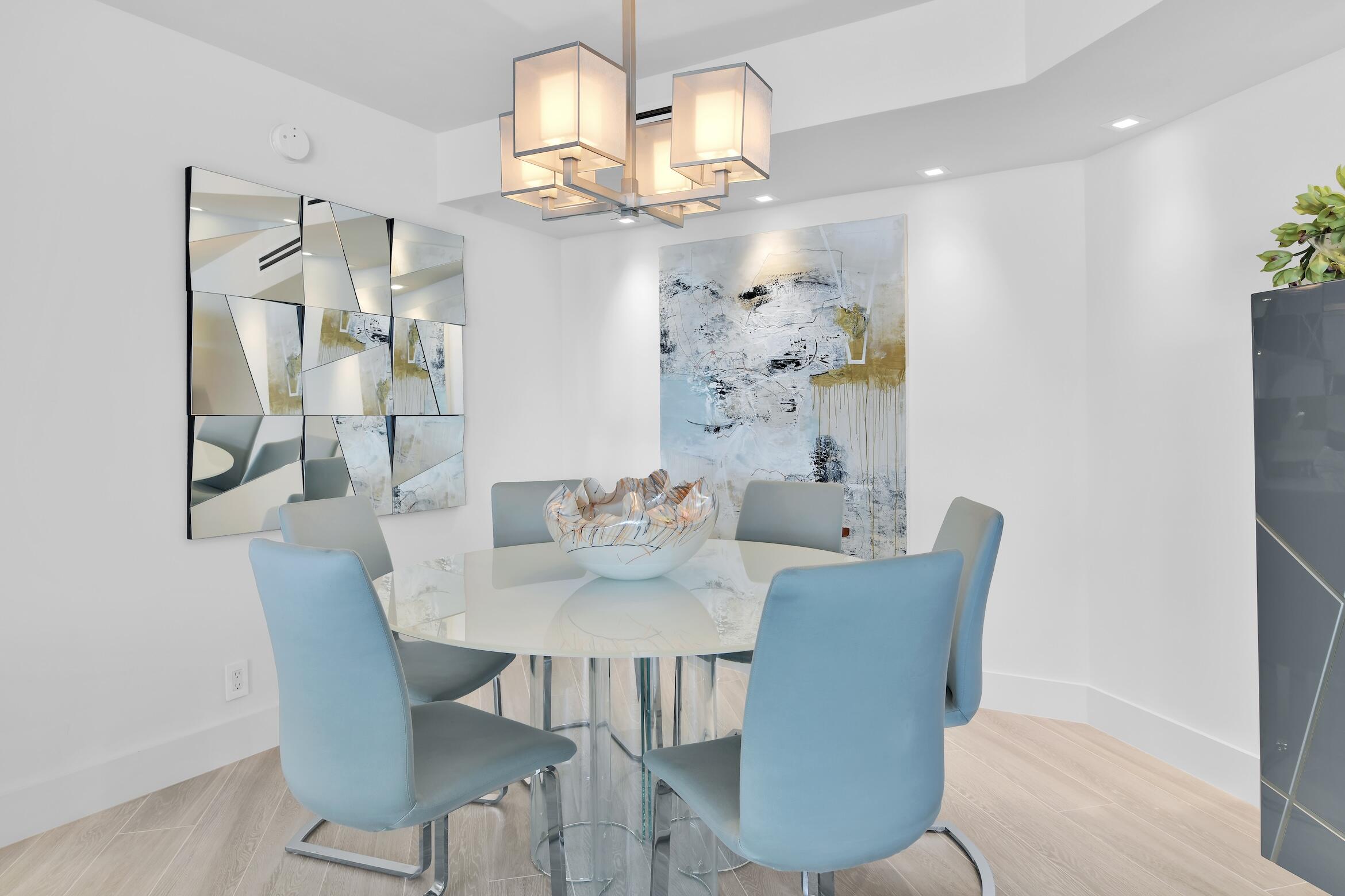 550 South Ocean Boulevard, Unit 1004 Boca Raton, FL 33432 - Photo 14 of 74 a view of a dining room with furniture