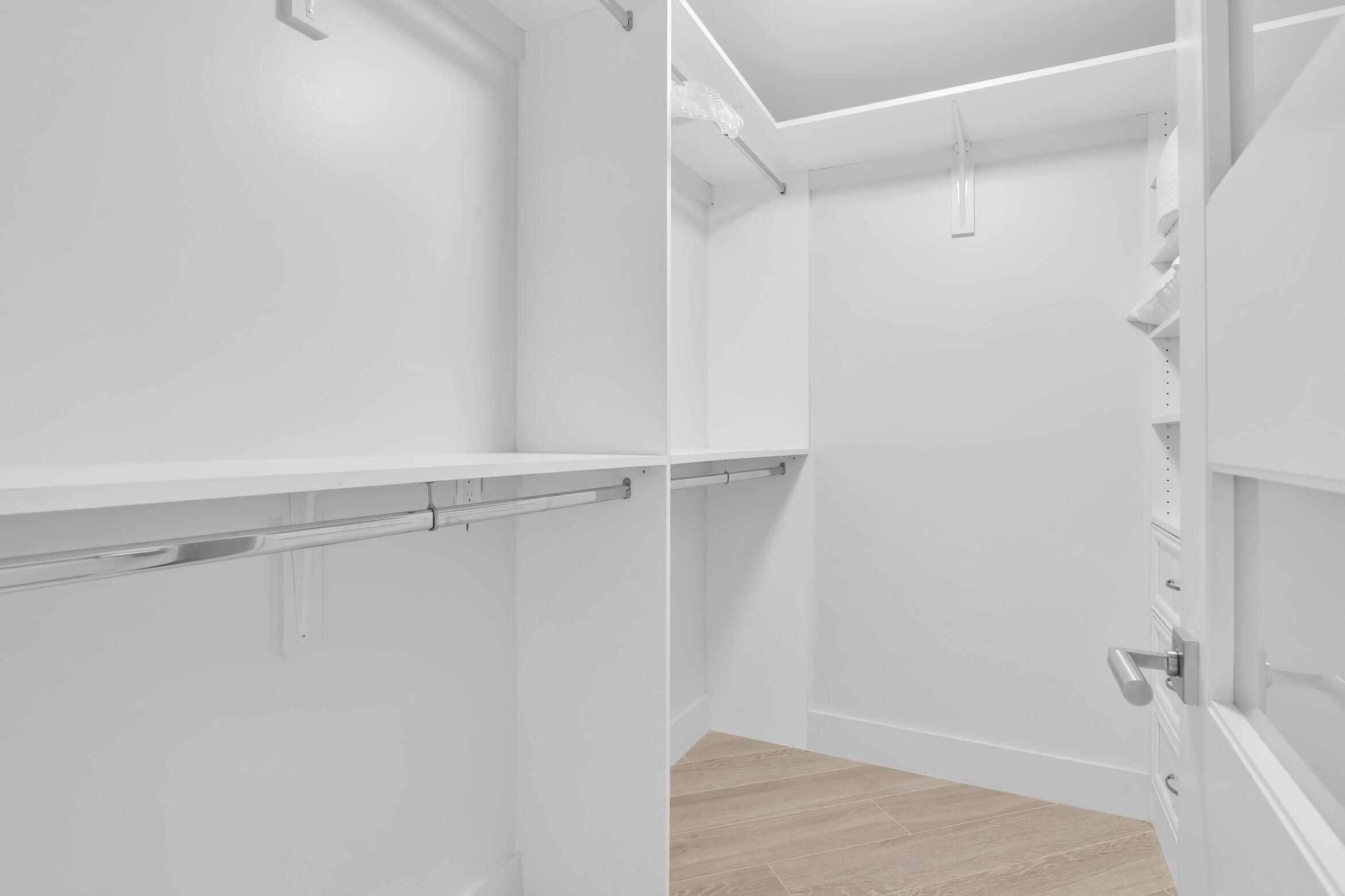 550 South Ocean Boulevard, Unit 1004 Boca Raton, FL 33432 - Photo 28 of 74 a view of walk in closet with empty racks