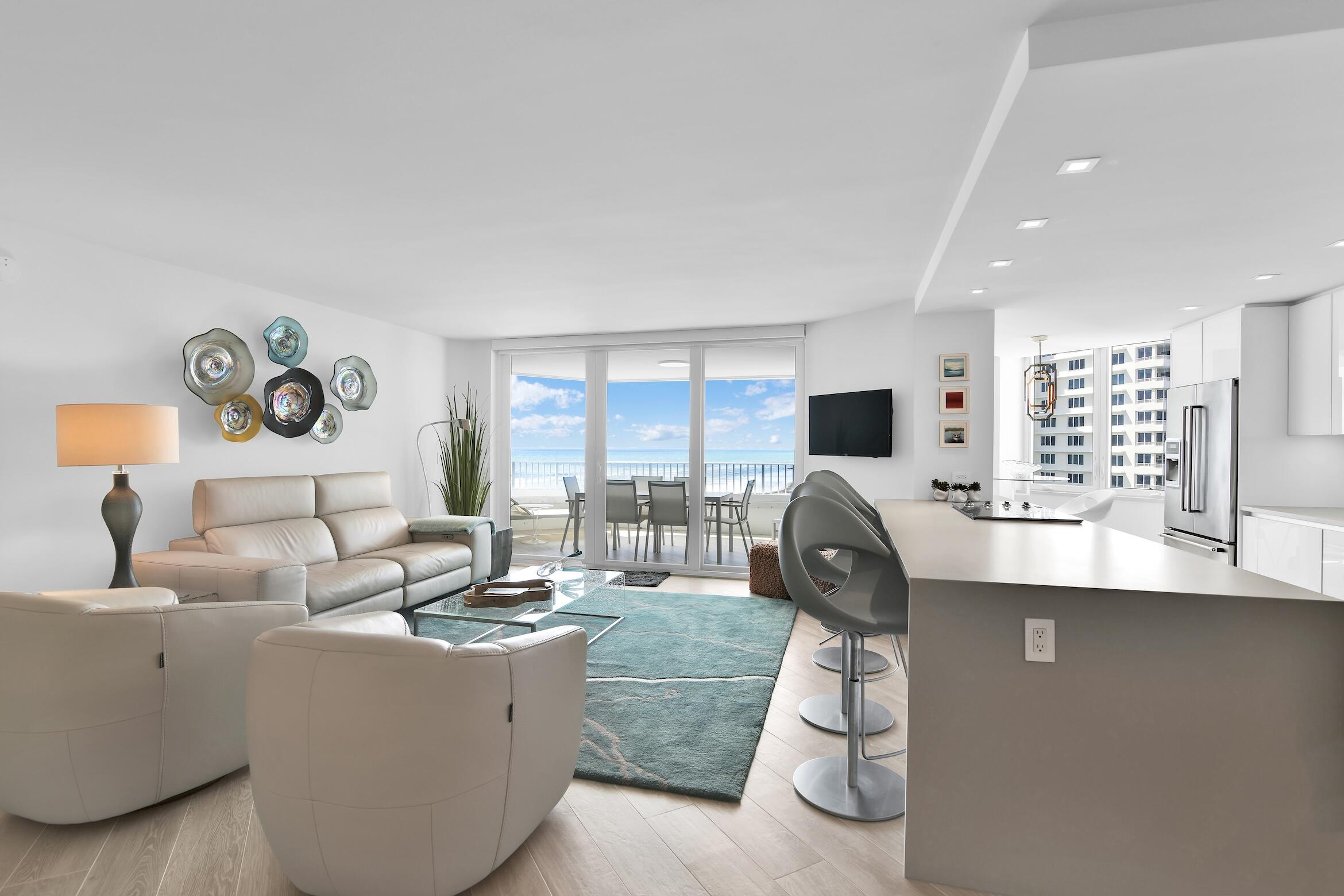 550 South Ocean Boulevard, Unit 1004 Boca Raton, FL 33432 - Photo 3 of 74 a living room with furniture and a window