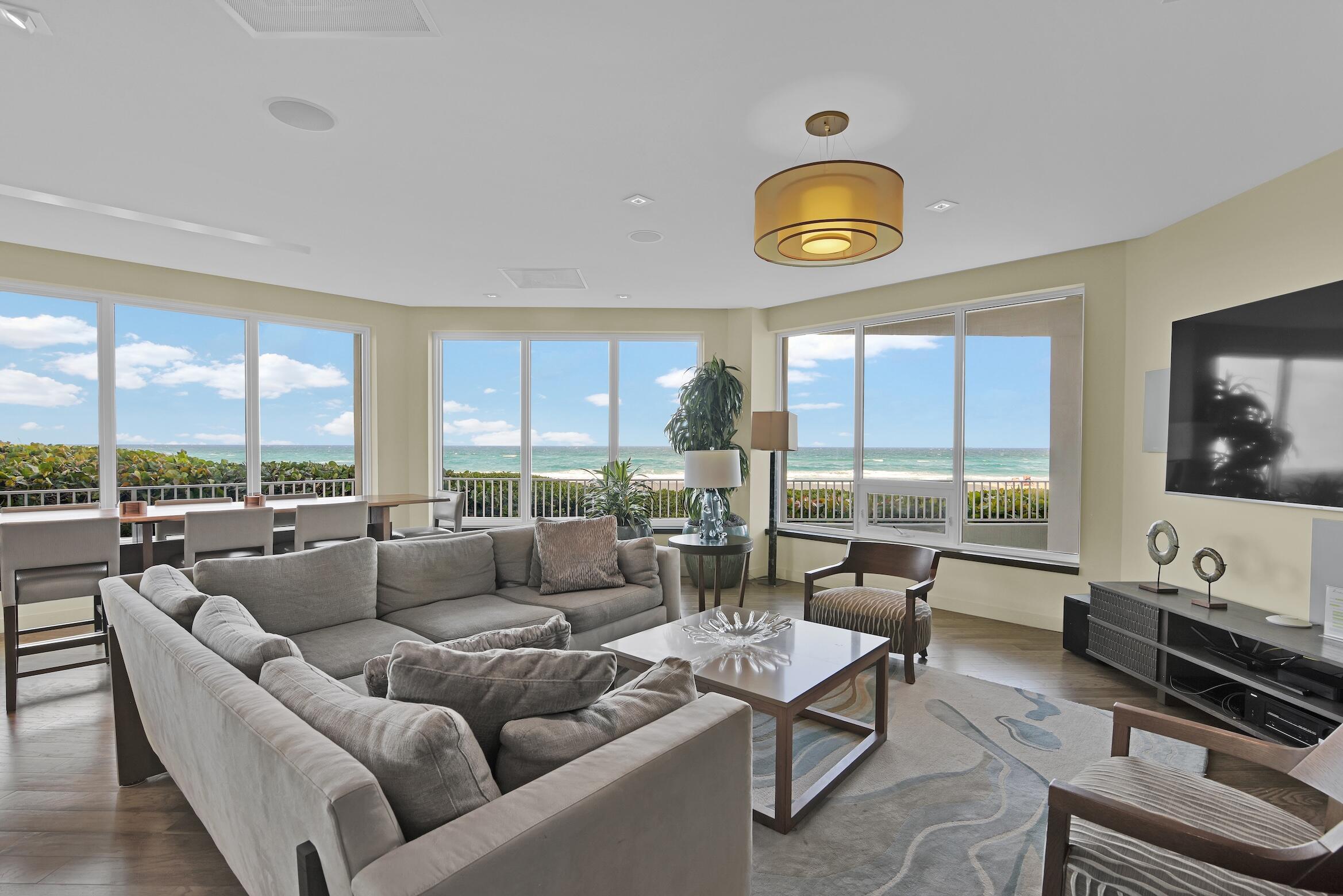 550 South Ocean Boulevard, Unit 1004 Boca Raton, FL 33432 - Photo 34 of 74 a living room with furniture and a large window