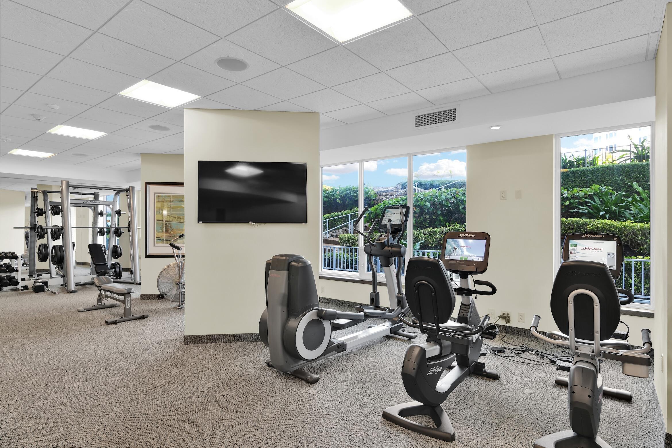 550 South Ocean Boulevard, Unit 1004 Boca Raton, FL 33432 - Photo 53 of 74 a view of a room with gym equipment