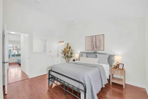 a bedroom with a bed and a view of bathroom