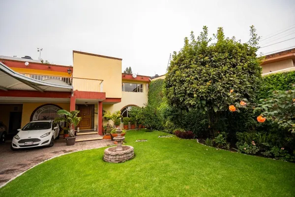 a car parked in front of the house