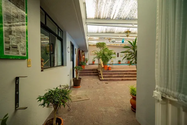 a view of a porch with furniture
