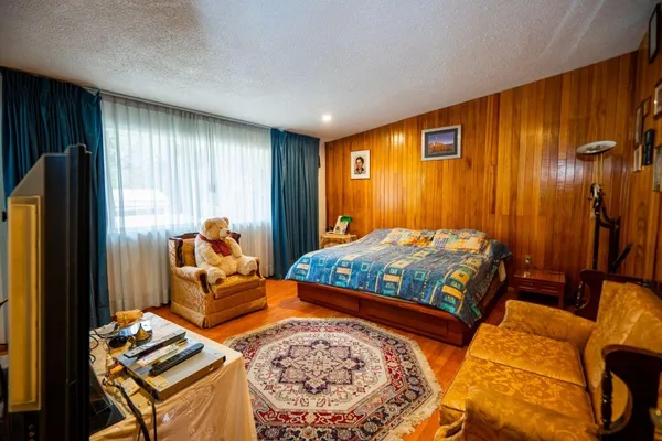 a living room with a couch and a table