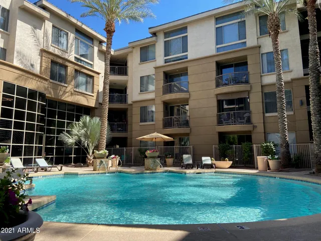 a view of a building with a yard