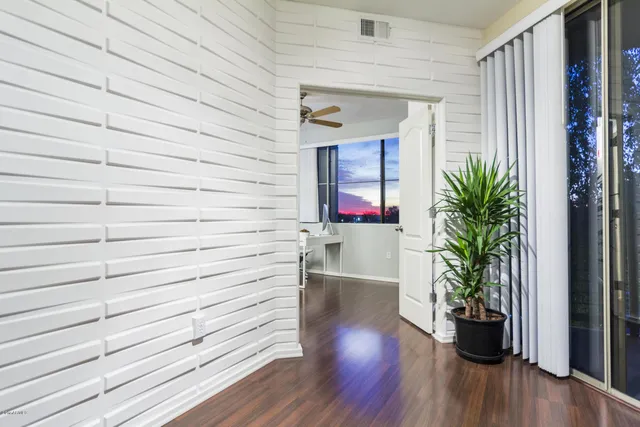 a potted plant sitting on a wooden floor
