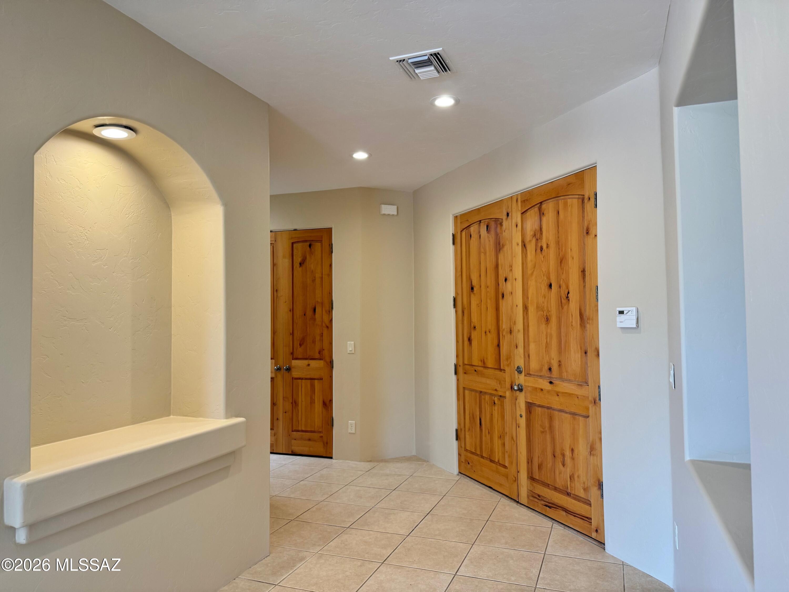 16781 Sycamore Ridge Trail Vail, AZ 85641 - Photo 7 of 50 Foyer with soaring ceilings and 8-ft solid wood doors