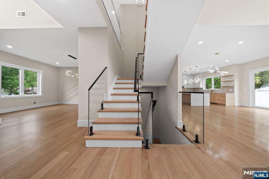 317 Edstan Way Paramus, NJ 07652 - Photo 20 of 48 a view of entryway and hall with wooden floor